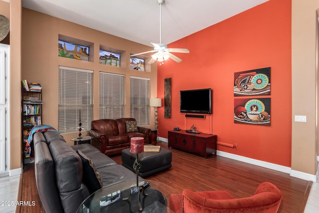 6531 E Star Valley St, Mesa, AZ 85215 - living room with ceiling fan, wood finished floors, a towering ceiling, and baseboards