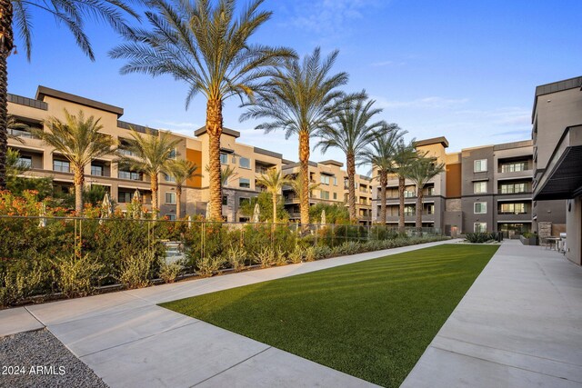 view of patio / terrace with a balcony, exterior kitchen, and grilling area