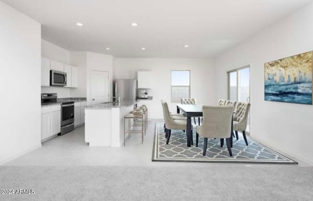 view of carpeted dining room