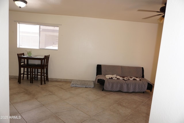 1670 W Bitter Orange St, Tucson, AZ 85705 - living area with tile patterned floors and ceiling fan