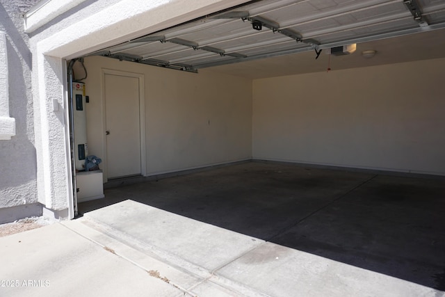 1670 W Bitter Orange St, Tucson, AZ 85705 - garage featuring a garage door opener