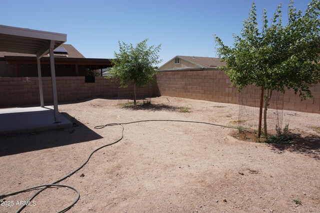 1670 W Bitter Orange St, Tucson, AZ 85705 - fenced backyard featuring a patio