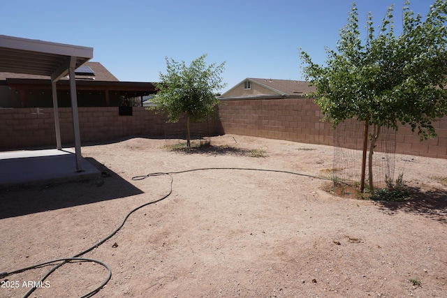 1670 W Bitter Orange St, Tucson, AZ 85705 - fenced backyard with a patio