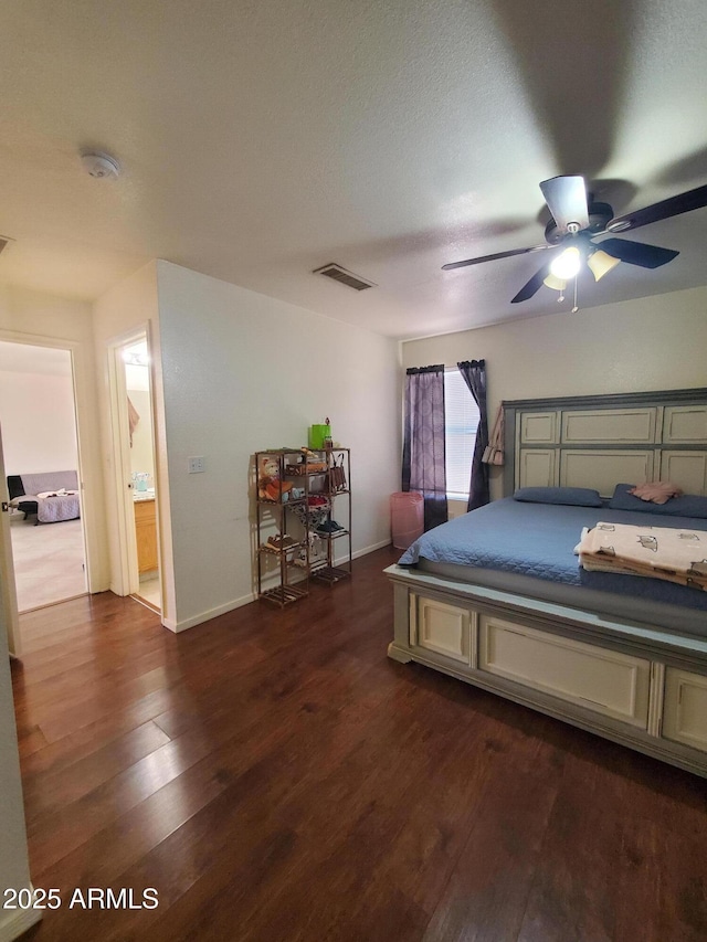 1670 W Bitter Orange St, Tucson, AZ 85705 - bedroom with dark wood-style flooring, baseboards, and ceiling fan