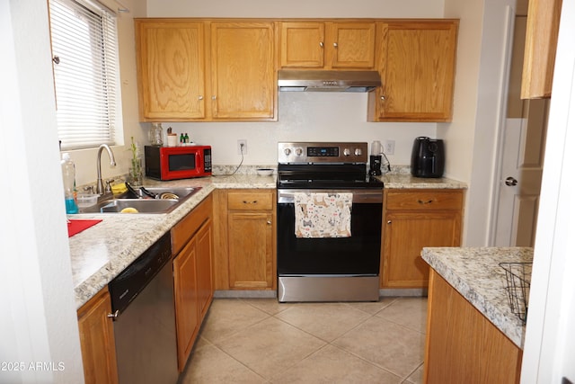1670 W Bitter Orange St, Tucson, AZ 85705 - kitchen with appliances with stainless steel finishes, ventilation hood, a sink, light countertops, and light tile patterned floors