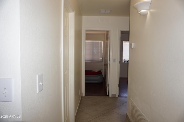 1670 W Bitter Orange St, Tucson, AZ 85705 - corridor featuring tile patterned floors