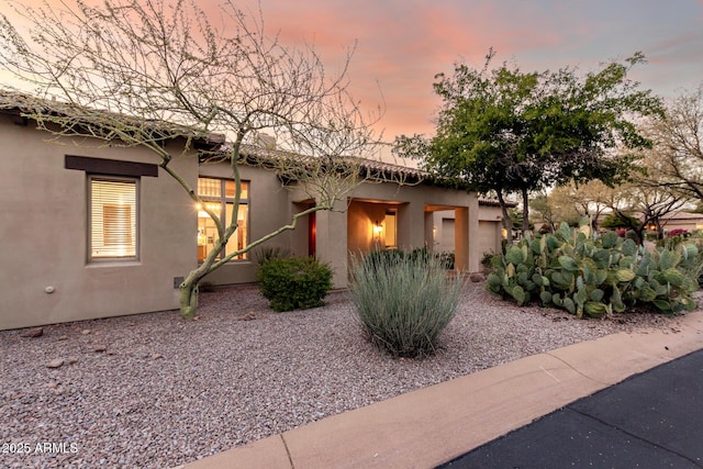 view of property exterior at dusk