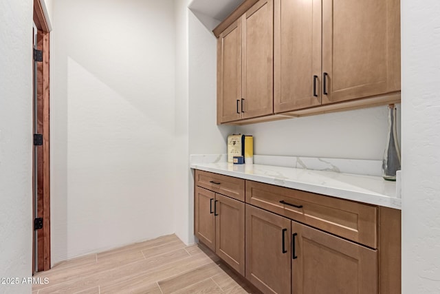 bar with light stone countertops