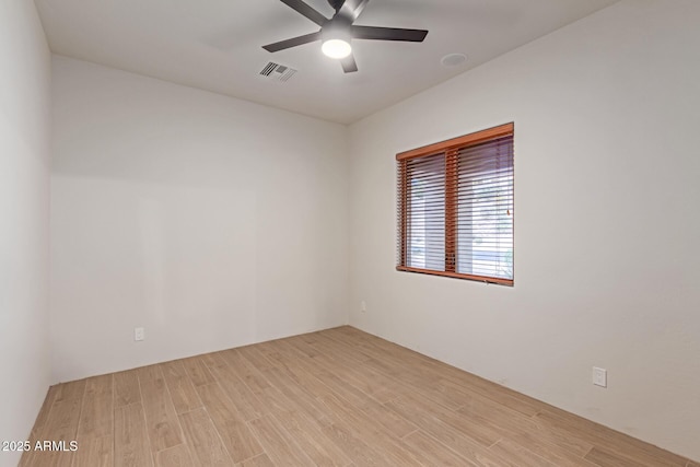 unfurnished room featuring ceiling fan and light hardwood / wood-style flooring