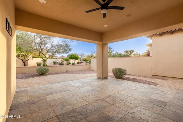 view of patio / terrace featuring ceiling fan