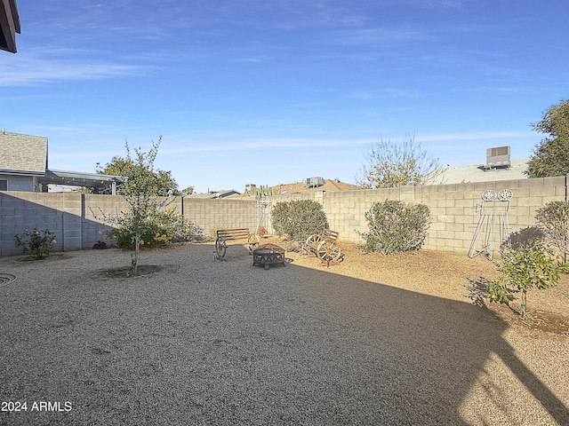 view of yard featuring a fire pit