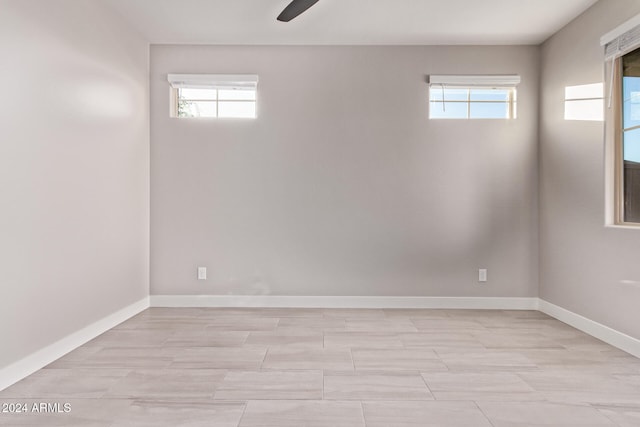 basement with ceiling fan