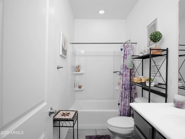 bathroom with toilet, vanity, recessed lighting, tile patterned flooring, and shower / tub combo