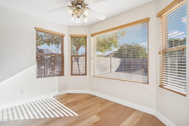 unfurnished room featuring wood-type flooring and ceiling fan