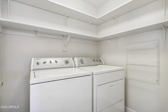 laundry area featuring independent washer and dryer