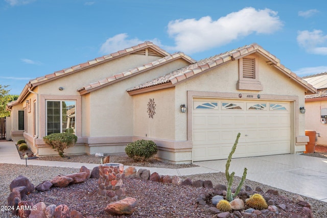 view of front of home with a garage