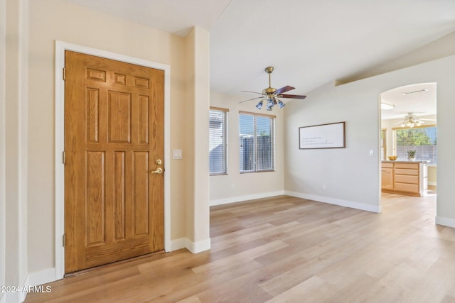 foyer featuring light wood-type flooring, ceiling fan, and lofted ceiling