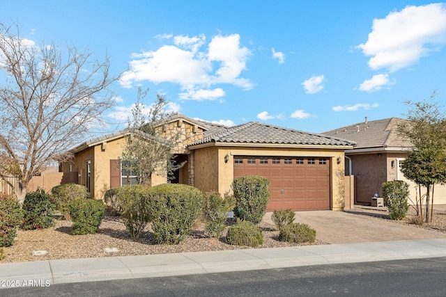 view of front of property featuring a garage