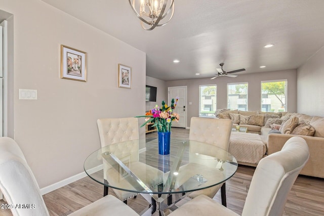5913 E Thomas Rd, Scottsdale, AZ 85251 - dining space featuring light wood-type flooring, a chandelier, recessed lighting, and baseboards