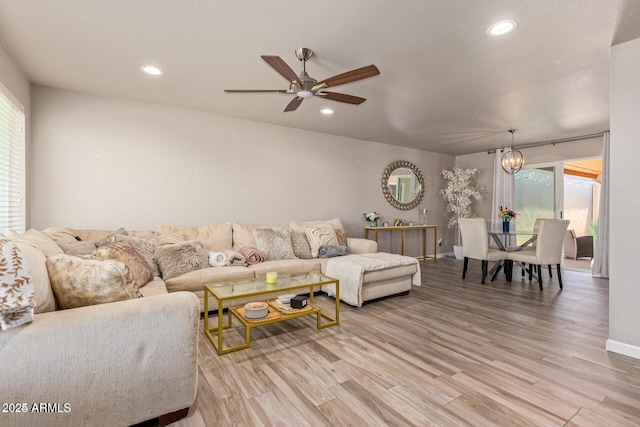 5913 E Thomas Rd, Scottsdale, AZ 85251 - living area featuring healthy amount of natural light, light wood-type flooring, baseboards, recessed lighting, and a ceiling fan