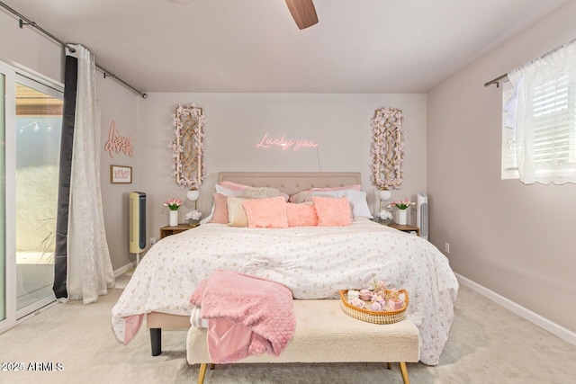 5913 E Thomas Rd, Scottsdale, AZ 85251 - carpeted bedroom with ceiling fan and baseboards