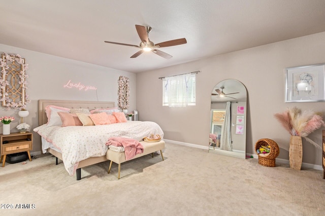 5913 E Thomas Rd, Scottsdale, AZ 85251 - carpeted bedroom with ceiling fan and baseboards