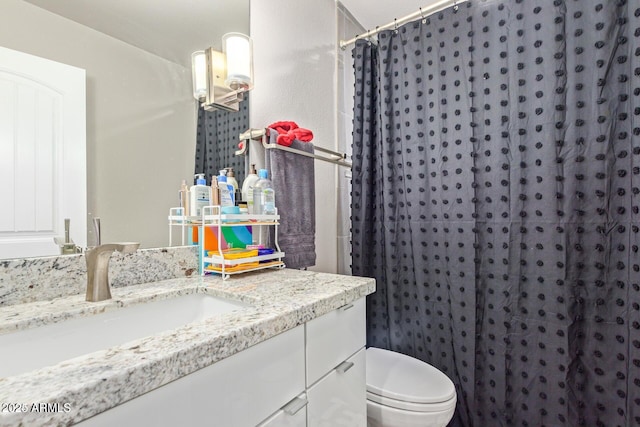 5913 E Thomas Rd, Scottsdale, AZ 85251 - bathroom featuring vanity, toilet, and a shower with shower curtain