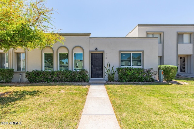 5913 E Thomas Rd, Scottsdale, AZ 85251 - view of front of property with a front yard and stucco siding