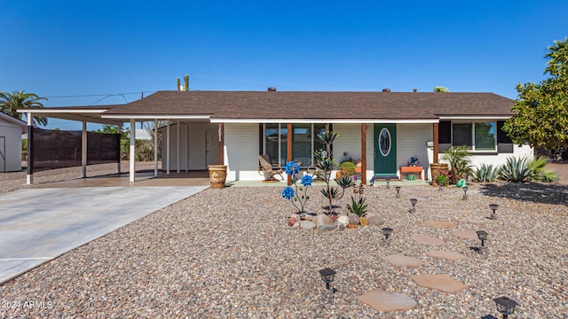 view of front facade featuring a carport