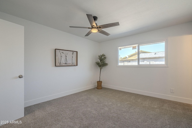 empty room with carpet flooring and ceiling fan