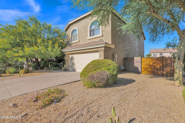 front of property featuring a garage