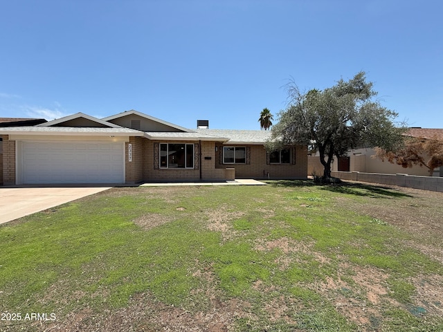 2337 E Manhatton Dr, Tempe, AZ 85282 - single story home with brick siding, an attached garage, and driveway