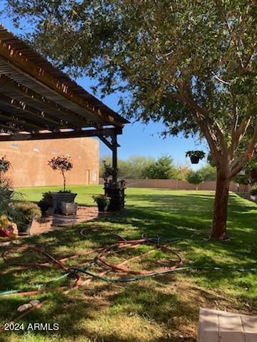 view of yard with a pergola