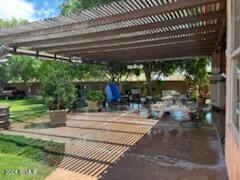 view of patio featuring a pergola