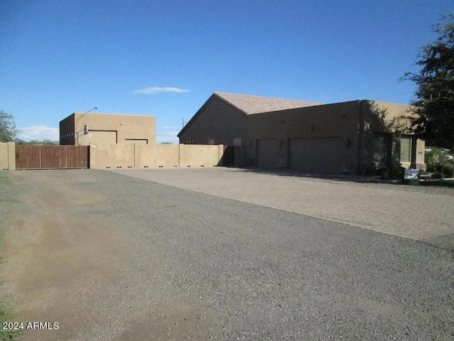 exterior space with a gate and fence