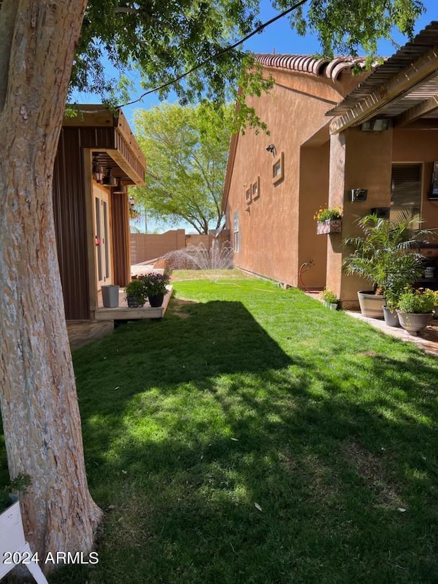 view of yard with fence