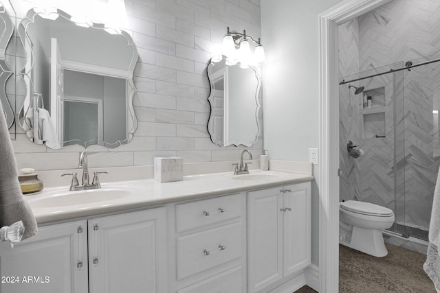 bathroom with backsplash, walk in shower, vanity, and toilet