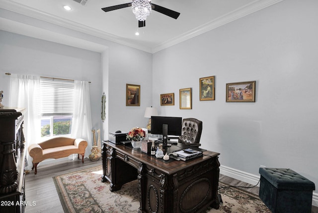 office area featuring light hardwood / wood-style floors, ceiling fan, and ornamental molding