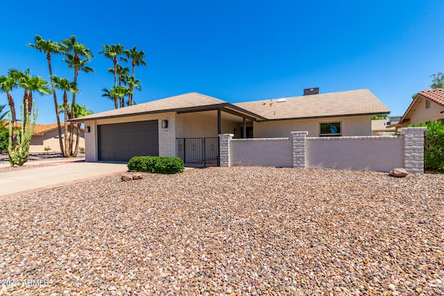 single story home featuring a garage