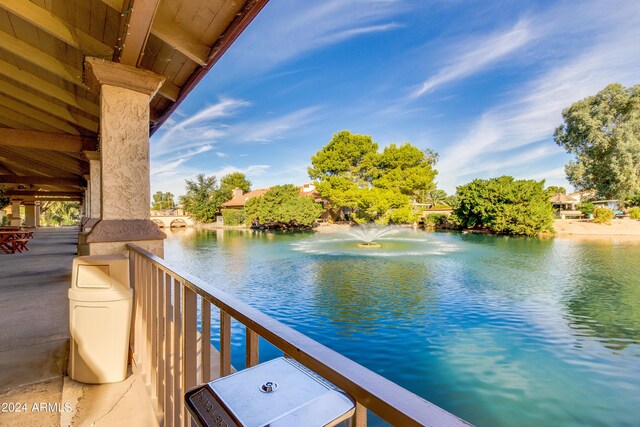 view of patio / terrace featuring a water view