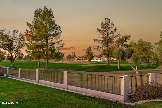 surrounding community featuring a lawn