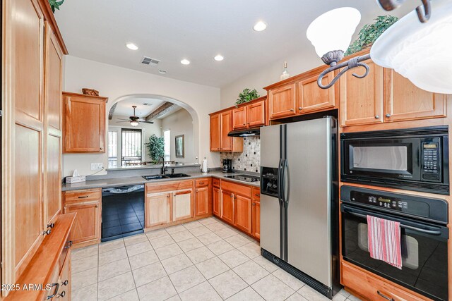 kitchen with light tile patterned floors, a sink, visible vents, a ceiling fan, and black appliances