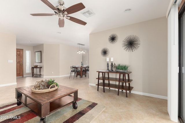 9809 W Behrend Dr, Peoria, AZ 85382 - living area with light tile patterned floors, a ceiling fan, baseboards, and recessed lighting
