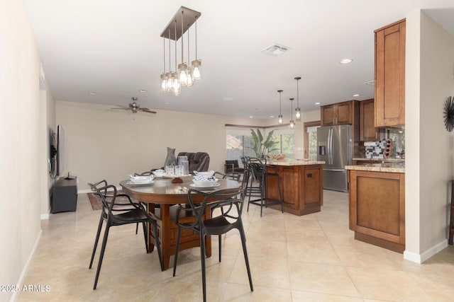 9809 W Behrend Dr, Peoria, AZ 85382 - dining area featuring recessed lighting, ceiling fan, baseboards, and light tile patterned flooring