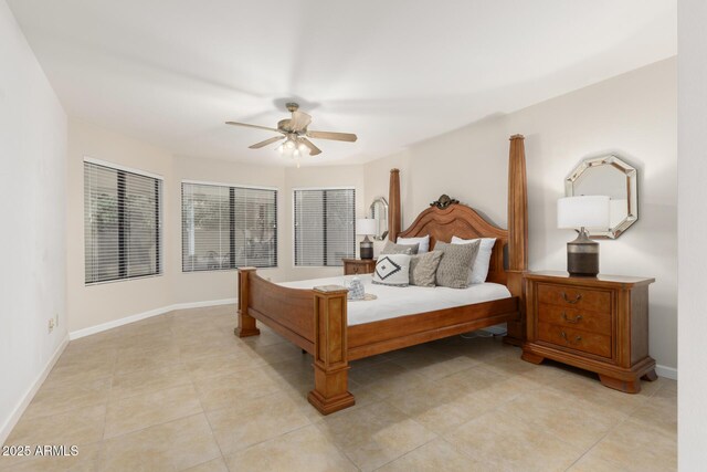 9809 W Behrend Dr, Peoria, AZ 85382 - bedroom featuring light tile patterned floors, ceiling fan, and baseboards