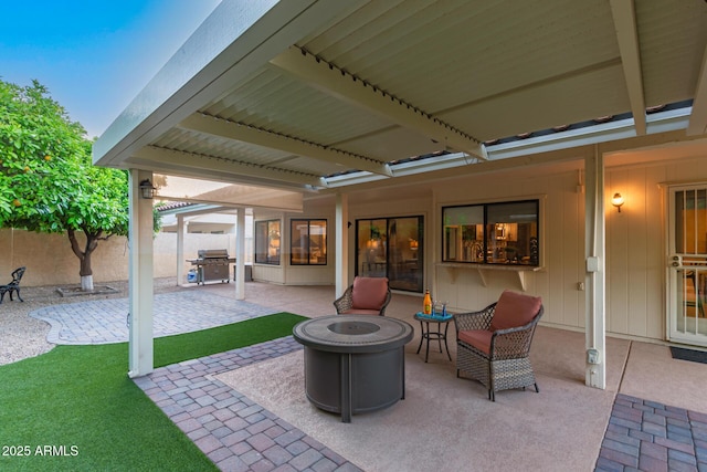 9809 W Behrend Dr, Peoria, AZ 85382 - view of patio featuring an outdoor fire pit, fence, and grilling area
