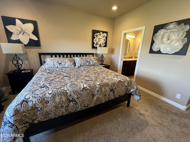 6145 E Cave Creek Rd Unit 203, Cave Creek, AZ 85331 - carpeted bedroom featuring baseboards, ensuite bathroom, and recessed lighting