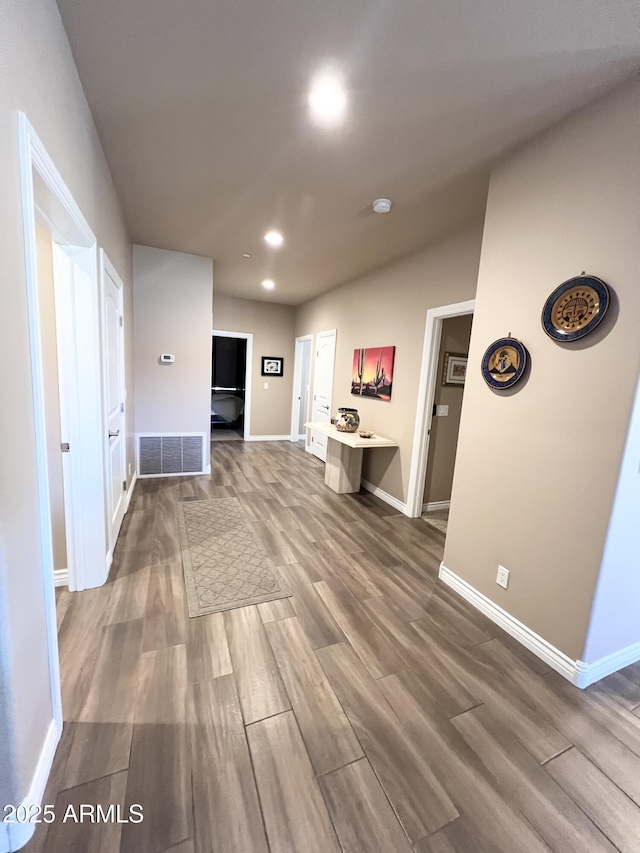 6145 E Cave Creek Rd Unit 203, Cave Creek, AZ 85331 - living room featuring wood finished floors, baseboards, and recessed lighting