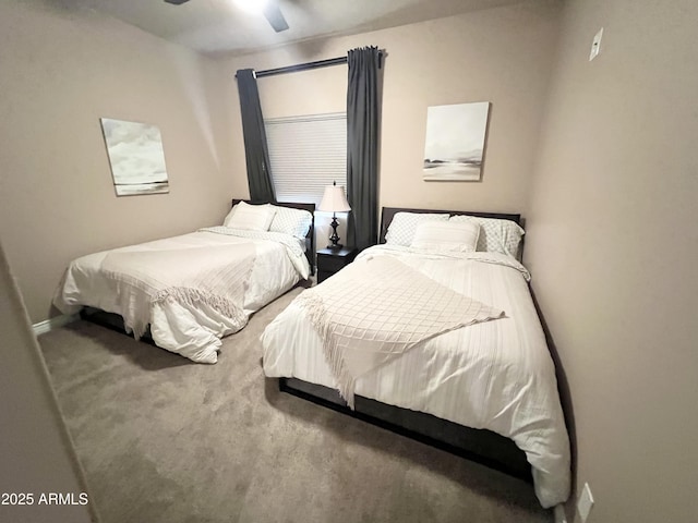 6145 E Cave Creek Rd Unit 203, Cave Creek, AZ 85331 - carpeted bedroom with baseboards and a ceiling fan
