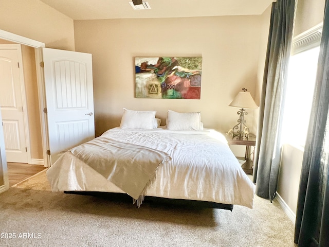 6145 E Cave Creek Rd Unit 203, Cave Creek, AZ 85331 - carpeted bedroom featuring baseboards
